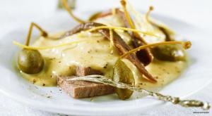 Roasted veal served with capers and a rich and creamy tuna 