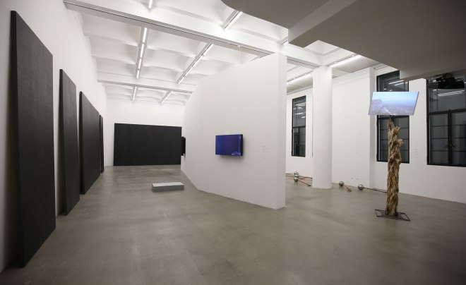 Pictured left: Maria Tanaguchi's imposing brick painting series, of which she states: ‘the work is about investigating the structures for making art'