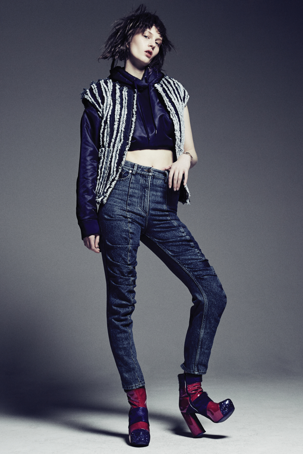 Y/Project’s cotton denim vest, polyamide hoodie and cotton jeans. Paka Paka bracelet.