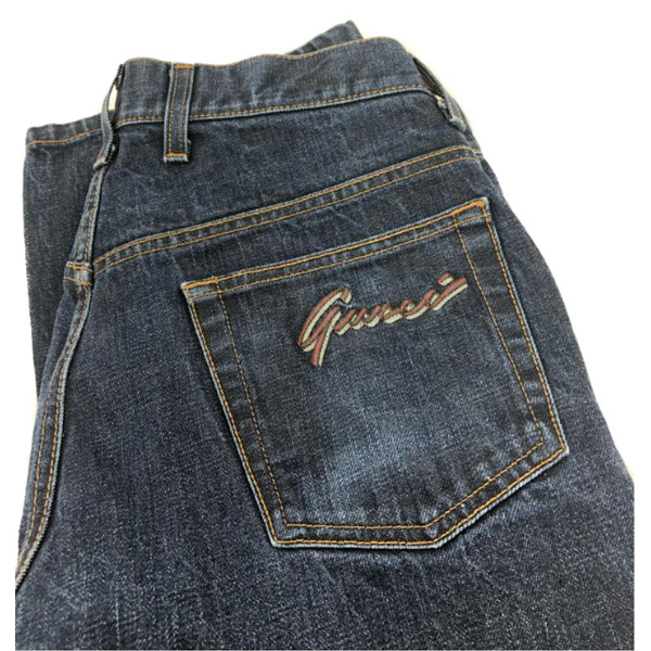 90s Gucci "over-branded" jeans from Goodwill's "Worn Not Wasted" Bluebox $39.99 (photo: Goodwill)