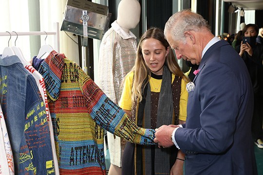 Charles, the Prince of Wales in the company of designer Bethany Williams, Mother of Pearl and Teatum Jones. (Photo by Darren Gerrish, British Fashion Council)